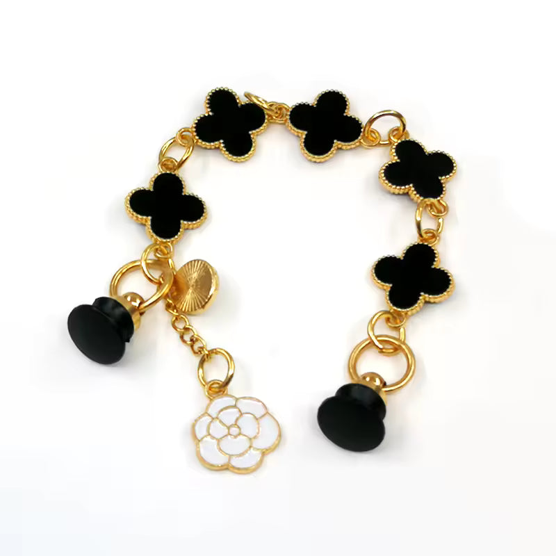 Pin's chaine van cleef noir