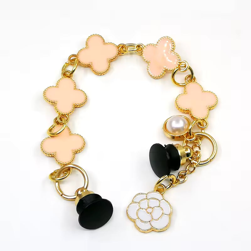 Pin's chaine van cleef rose